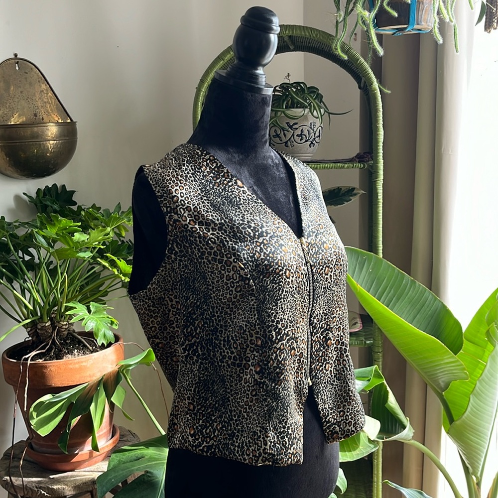 Shiny animal print vest. Is it a shirt or a layer?? You decide.